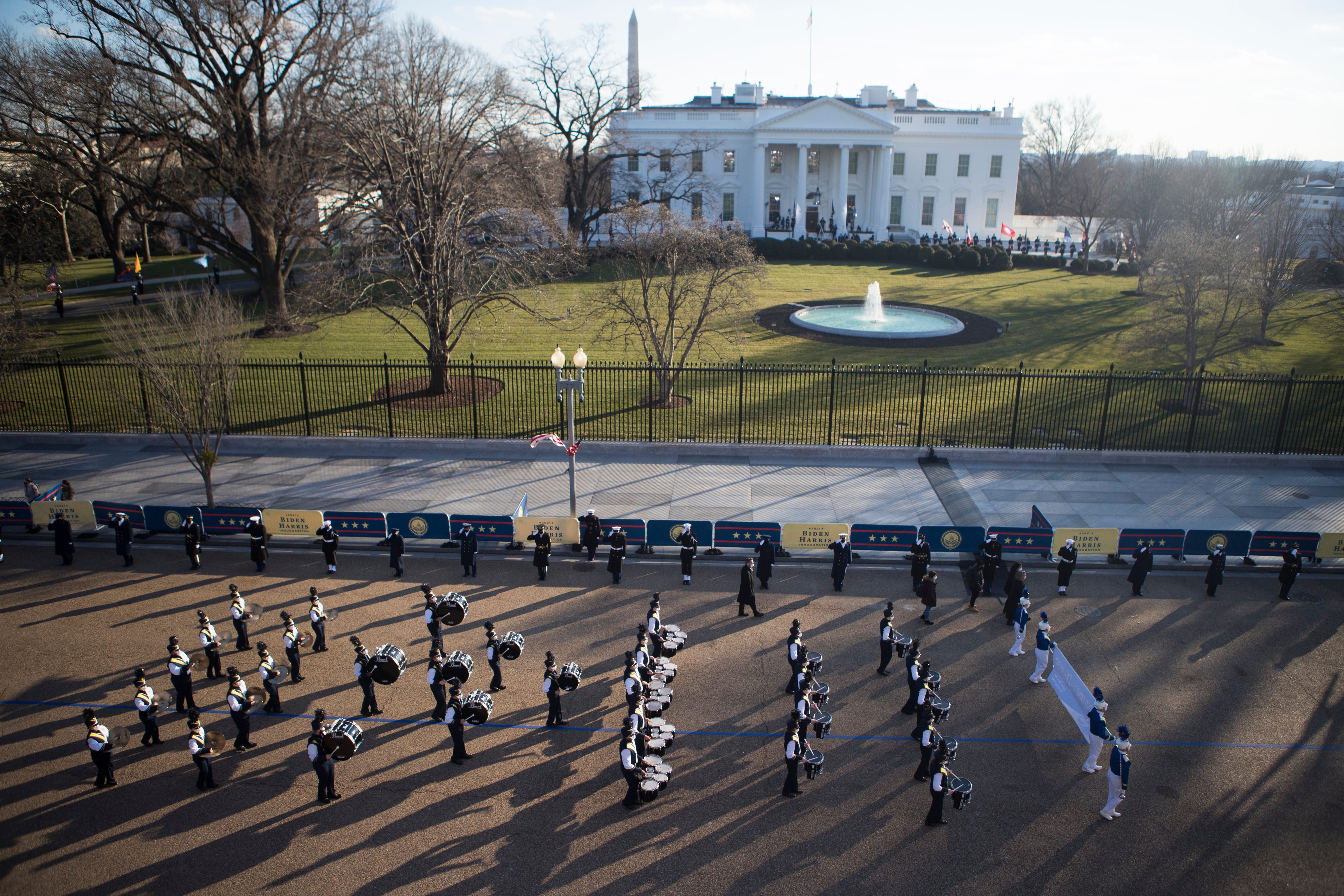 The University of Delaware Marching Band performs on Pennsylvania Avenue during the presidential escort of the 59th Inaugural Ceremonies in Washington on Jan 20, 2021.