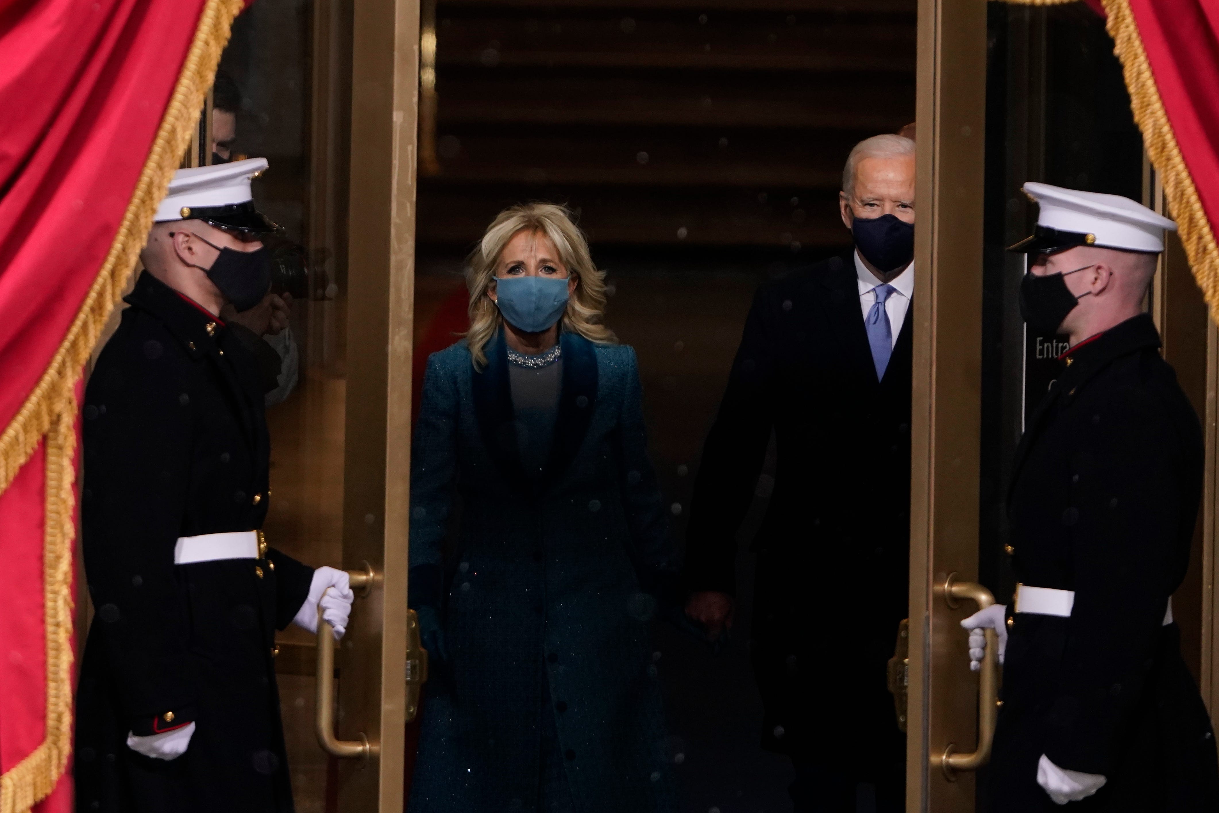 President-elect Joe Biden and his wife Jill, walk out for the 59th Presidential Inauguration at the U.S. Capitol in Washington, Wednesday, Jan. 20, 2021.