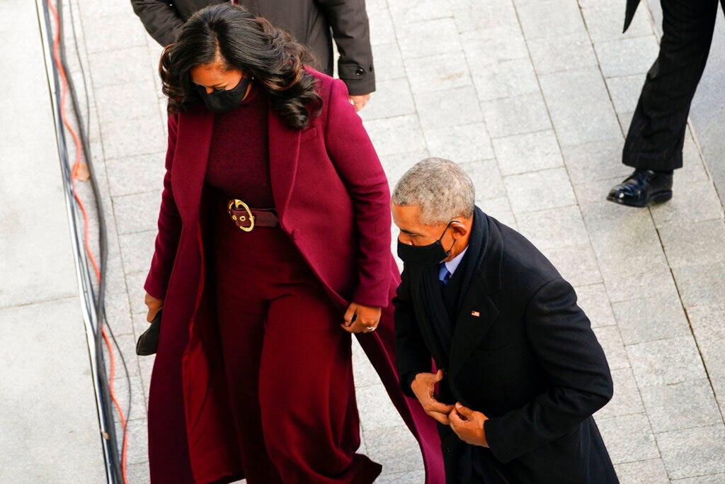 Former President Barack Obama and his wife Michelle arrives at the U.S. Capitol ahead of President-elect Joe Biden's inauguration at the U.S. Capitol in Washington, Wednesday, Jan. 20, 2021.