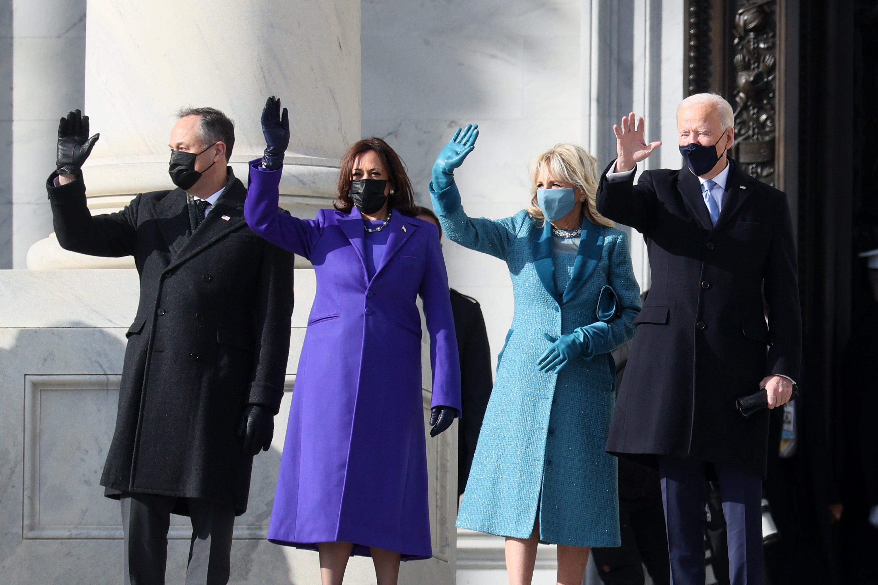(L-R) Doug Emhoff, U.S. Vice President-elect Kamala Harris, Jill Biden and President-elect Joe Biden wave as they arrive on the East Front of the U.S. Capitol for  the inauguration on Jan. 20, 2021 in Washington, DC.