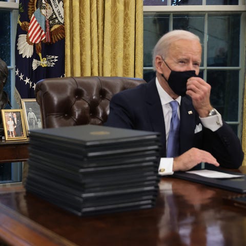 Joe Biden signs a series of executive orders in th