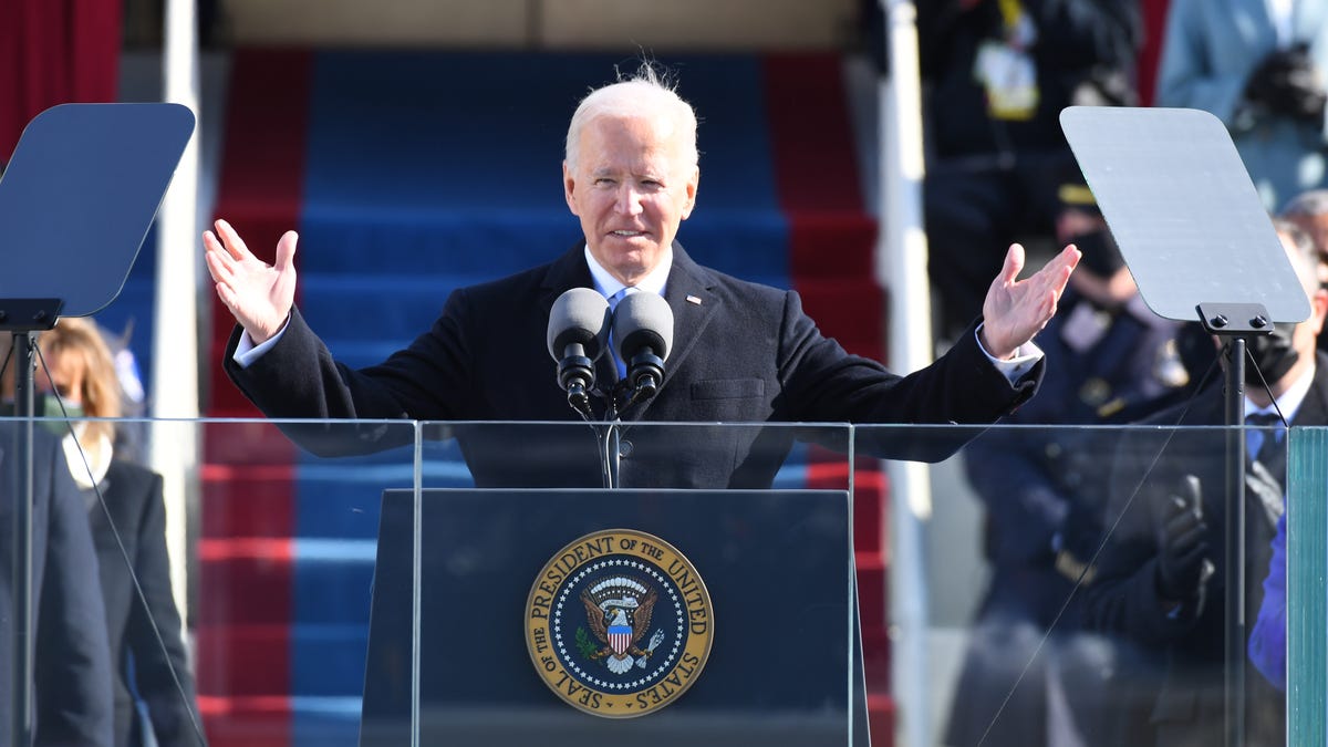 President Joe Biden waves to the crowd after being sworn in during his inauguration and the inauguration of Vice President Kamala Harris at the U.S. Capitol on Jan. 20, 2021.