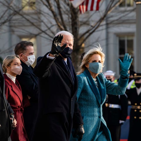 President Joe Biden and Dr. Jill Biden arrive at t