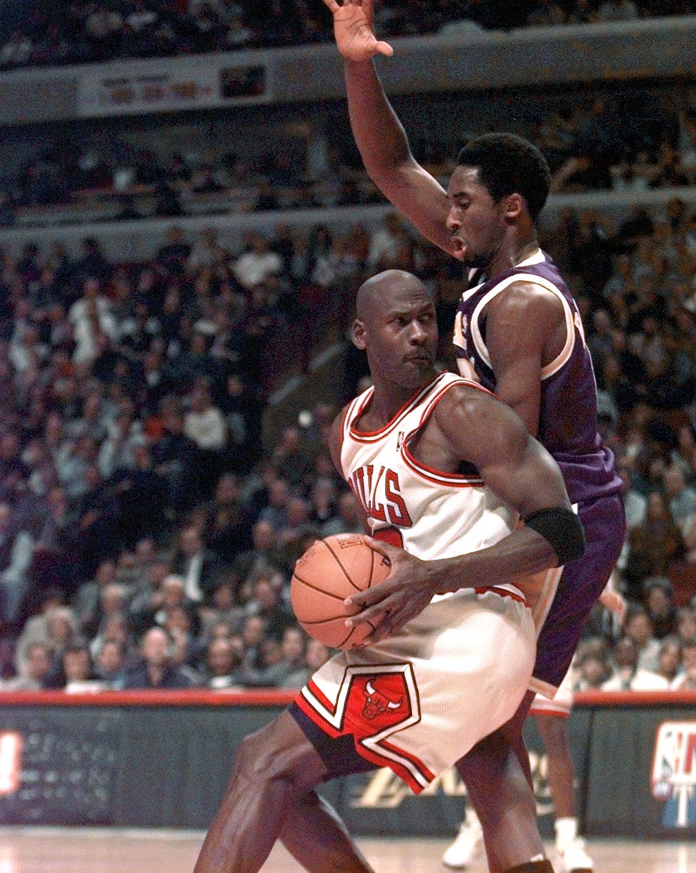Chicago's Michael Jordan is guarded by Los Angeles' Kobe Bryant in the second half on Dec.. 17, 1997 in Chicago
