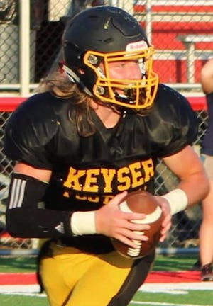 Keyser's Gavin Root is shown directing the Keyser offense. Root has committed to Frostburg State University to continue his football career.