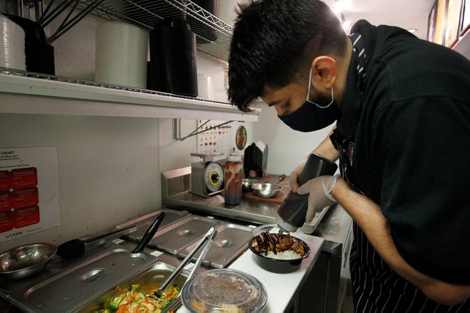 Patel makes teriyaki chicken Jan. 14.