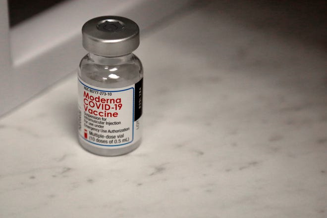 A vial of the Modern COVID-19 vaccine.