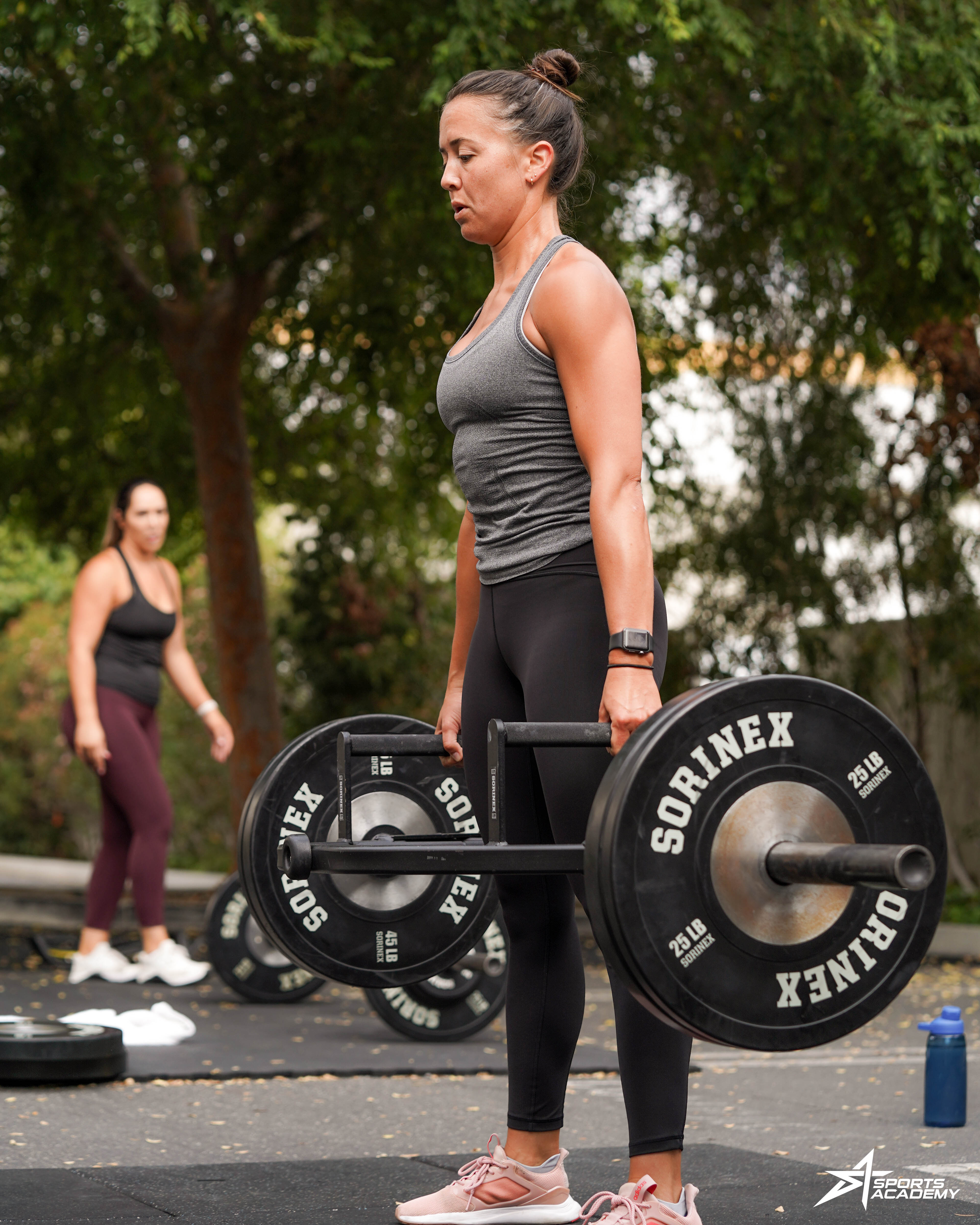 A woman works out at the renamed Sports Academy.