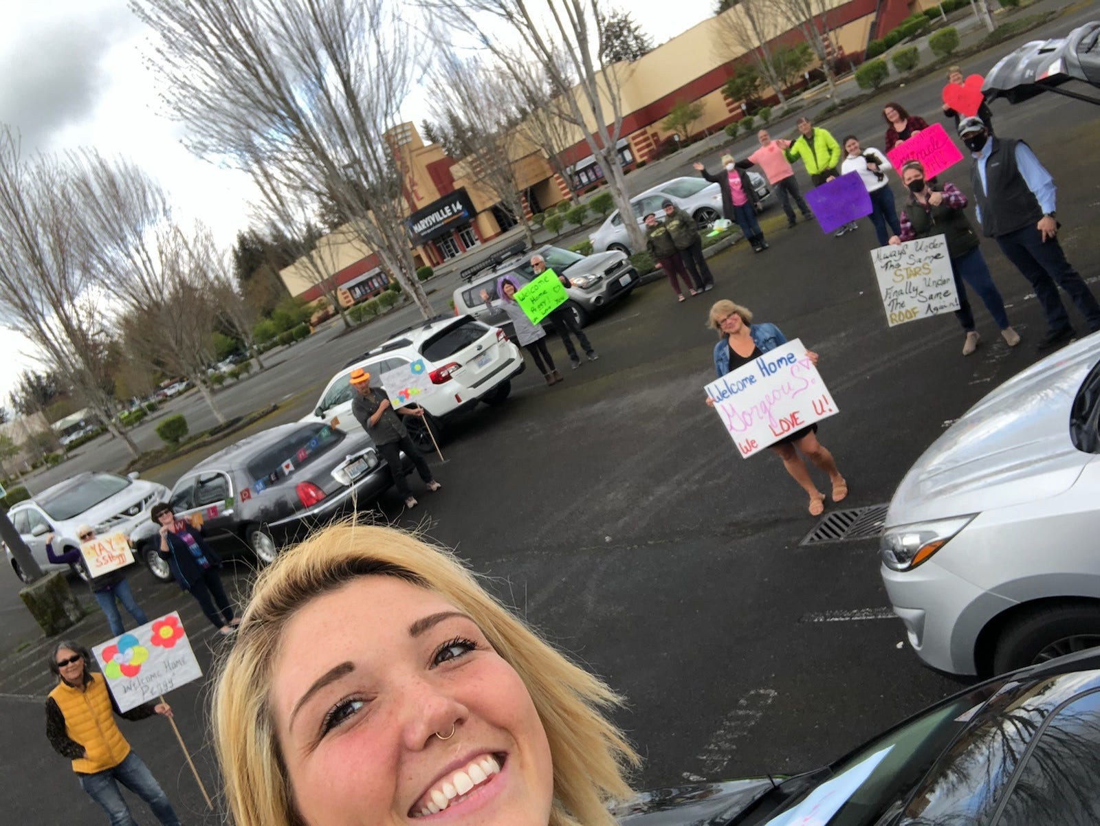 Friends gather in Marysville to show signs of support for Peggy Jahn while she was at Providence Regional Medical Center in Everett, Washington.