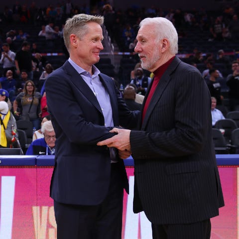 Golden State Warriors head coach Steve Kerr and Sa