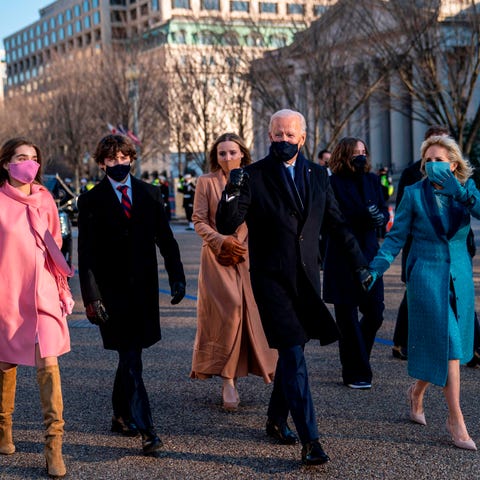 President Joe Biden and first lady Jill Biden walk