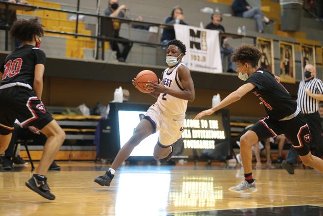 Topeka West senior Marque Wilkerson captured the city boys' scoring title, averaging 17.9 points per game for the Centennial League champion Chargers, just edging teammate Trevion Wilkerson.