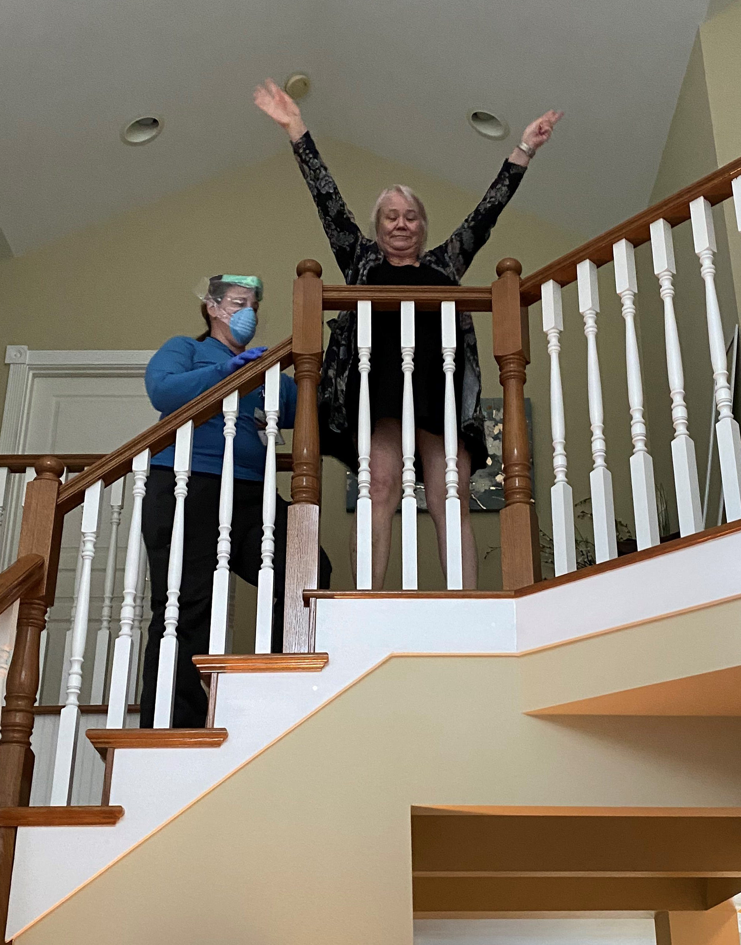 Peggy makes it up the 16 steps to the upper floor of her home in Marysville, Washington.