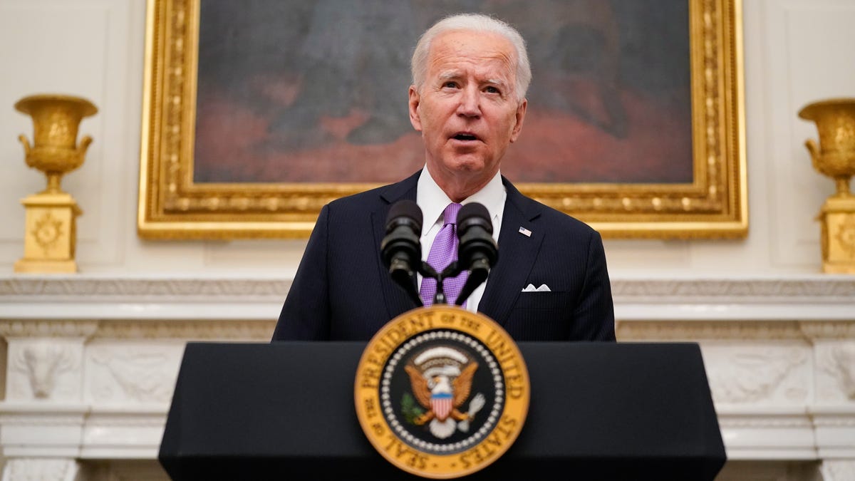 President Joe Biden speaks about the coronavirus in the State Dinning Room of the White House, Thursday, Jan. 21, 2021, in Washington.