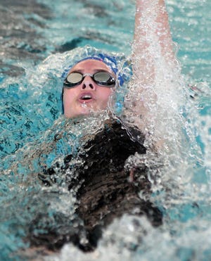 Laney's Madi Joy competes in the 100-yard backstroke during the Mideastern Conference swim championships at Brunswick Community College in Bolivia, N.C., Saturday, January 23, 2021.  [MATT BORN/STARNEWS]          