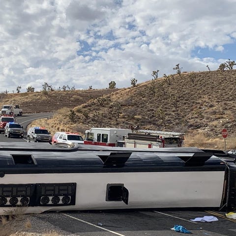 A tour bus heading to Grand Canyon West  rolled an