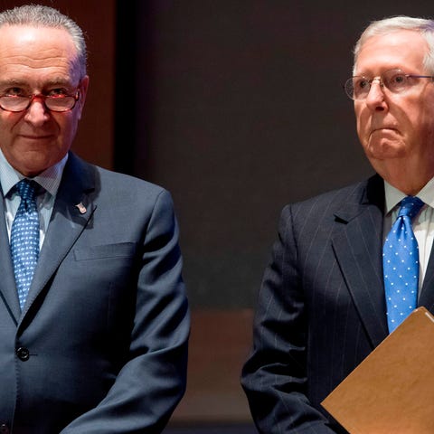 From left, then-Senate Minority Leader Chuck Schum