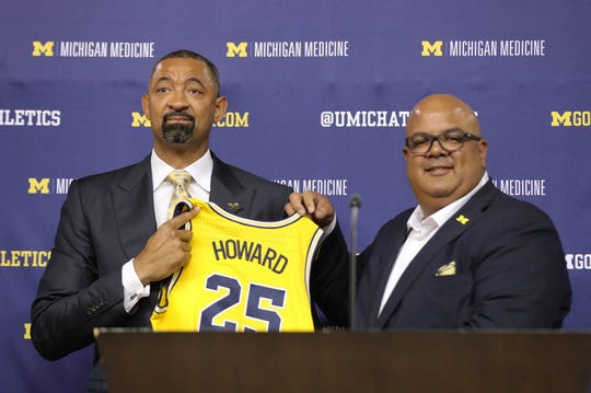 Michigan men's basketball coach Juwan Howard and AD Warde Manuel in 2019.