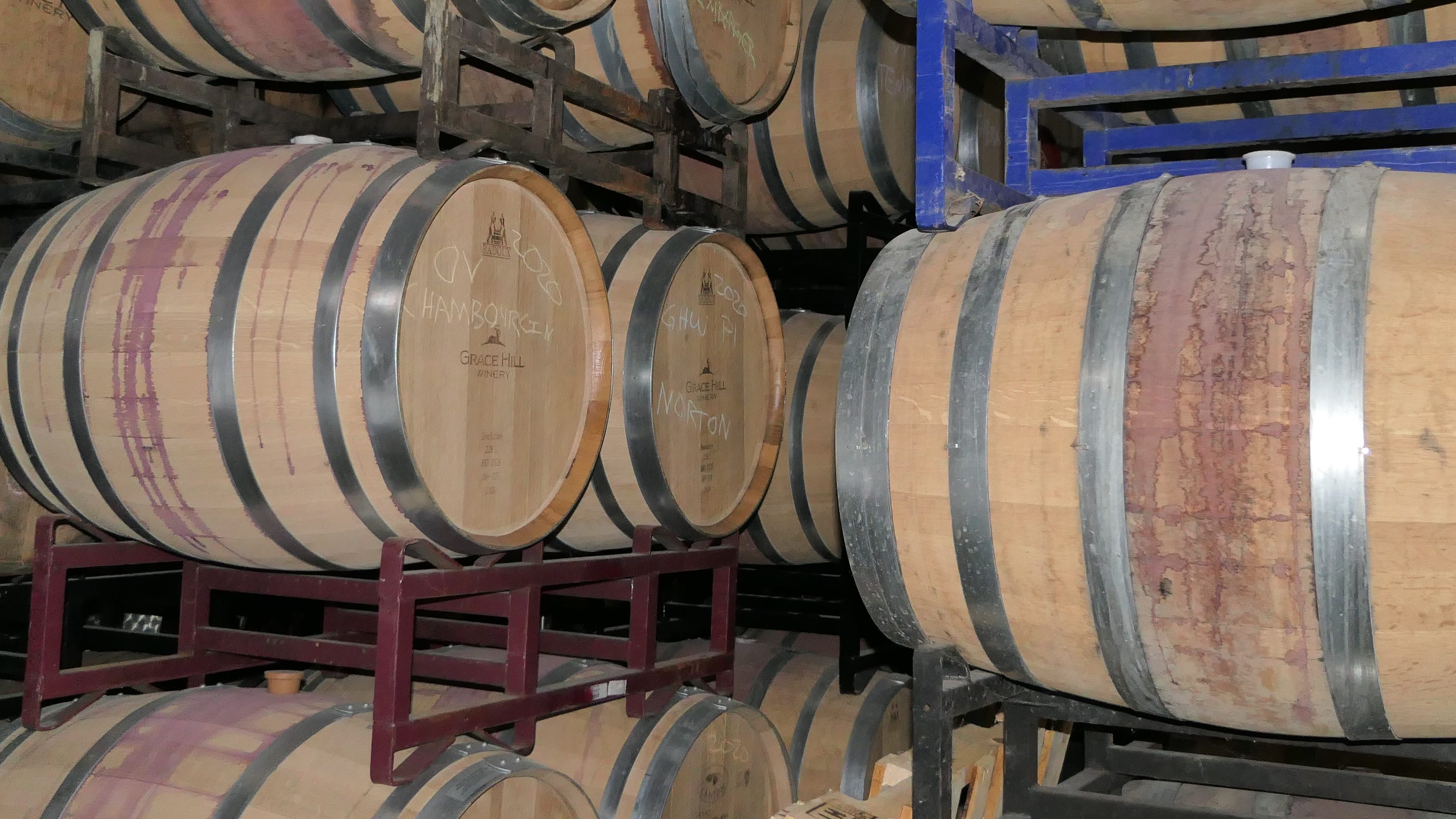 Wine barrels filled with wine at Grace Hill Winery in Whitewater.