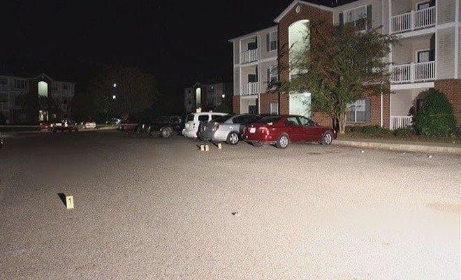 Police investigated the homicide of 21-year-old Brandon Harris who was shot in the parking lot of the Liberty Square Apartments.