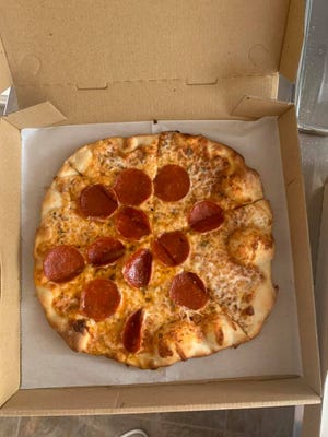 Fatty Matty's serves up personal-sized pizzas, New York style.