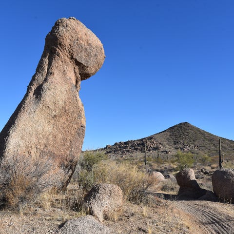 A bear-shaped rock overlooks Cone Mountain from th