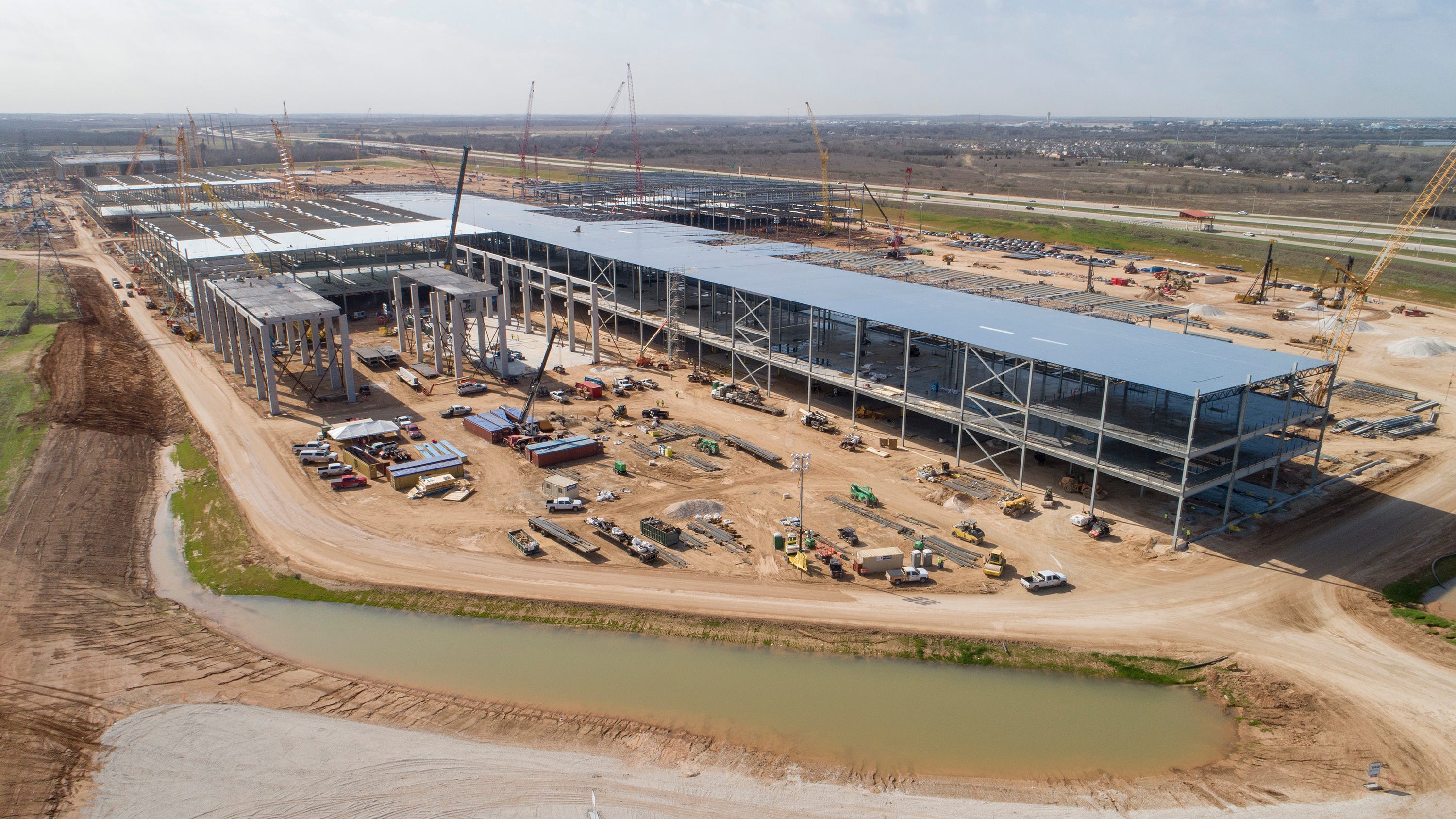 As it builds Austin factory, Tesla invests $1.5 billion in ...