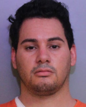 Polk County paramedic Joshua Colon, 31, was arrested Monday in the theft of three doses of the Moderna COVID-19 vaccine intended to inoculate first responders.