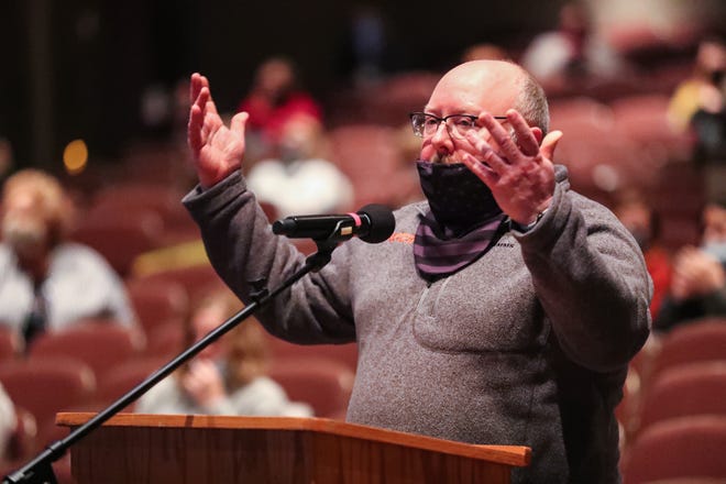 Steve Miller of Fond du Lac interrupted the Fond du Lac School Board Monday at Goodrich Little Theater to voice his frustrations about the current blended model of instruction. Around 60 parents attended the meeting in support of returning students to school, five days a week.