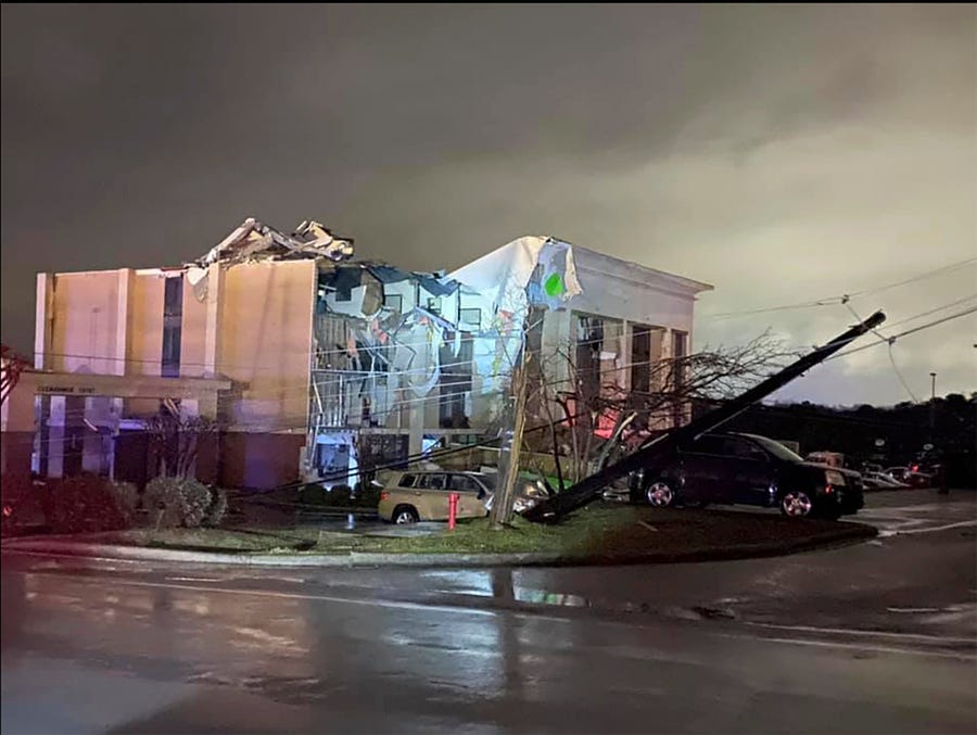 A Hampton Inn hotel is severely damaged after a tornado tore through Fultondale, Ala., on Monday, Jan. 25, 2021.