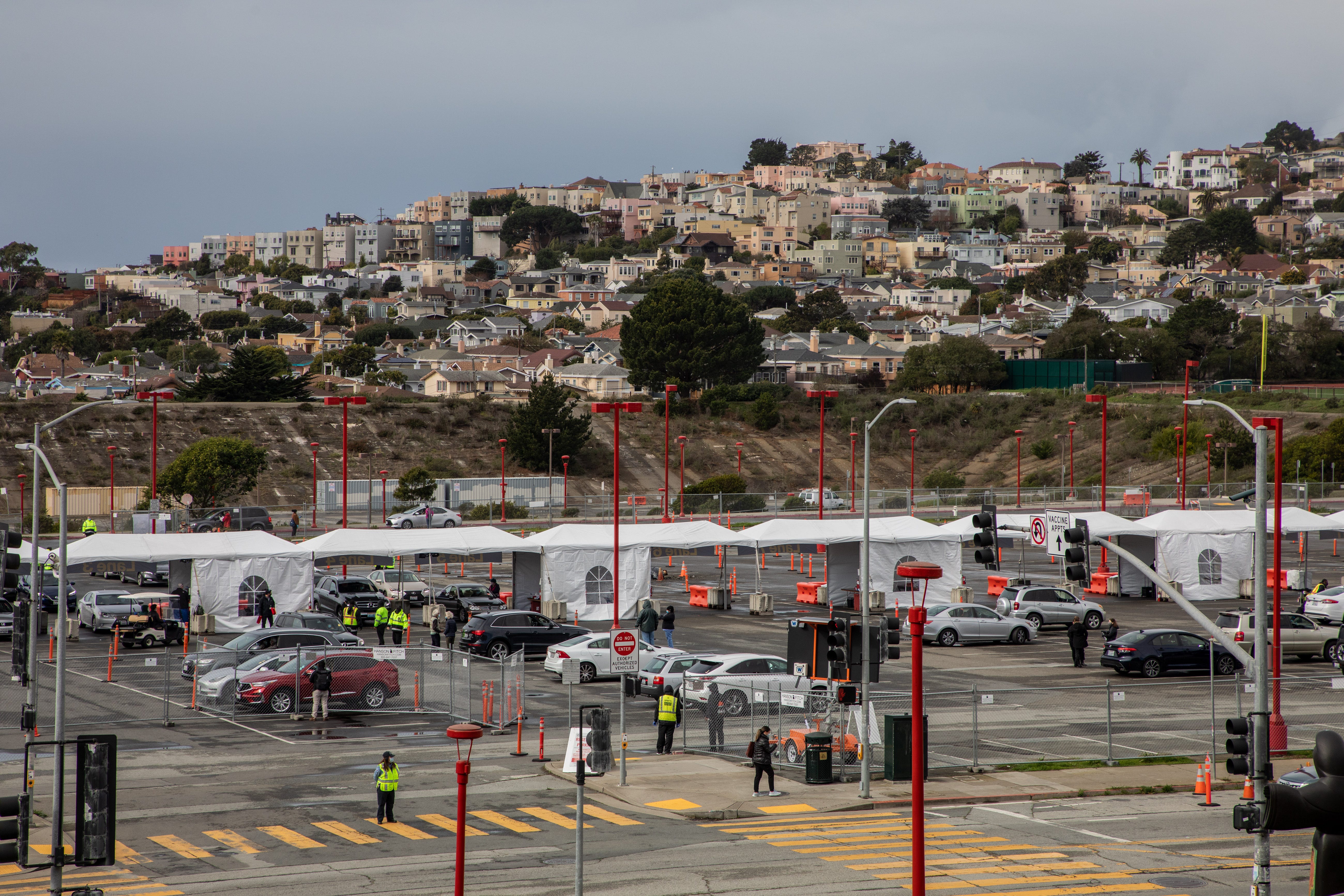 Moderna's COVID-19 vaccine is administered at City College of San Francisco, the city's first mass vaccination site, on Jan. 22. American health care workers and organizations push for a faster distribution of vaccines.