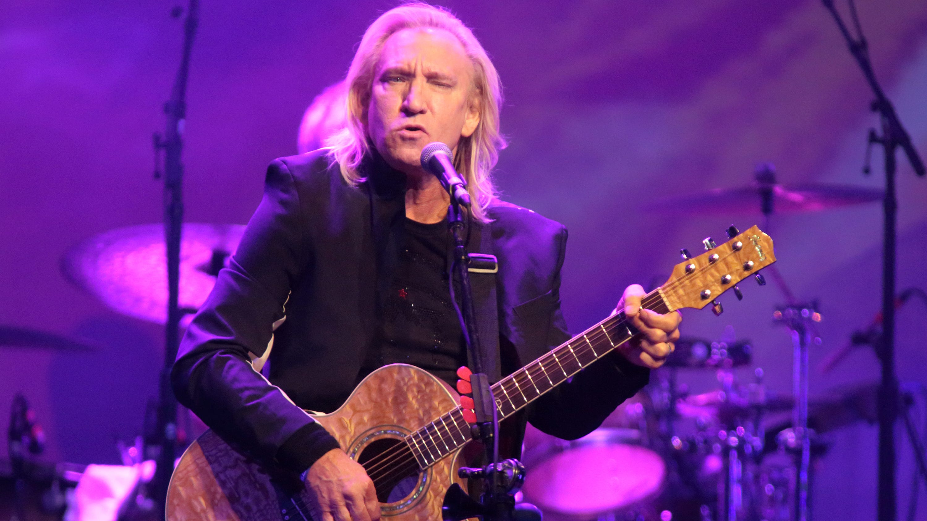 Eagles' Joe Walsh says new solo music got too dark: 'Gotta be careful'