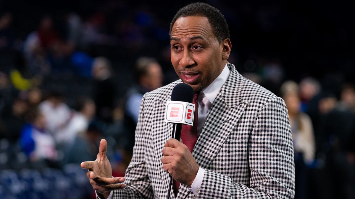 ESPN analyst Stephen A. Smith broadcasts before a game between the Philadelphia 76ers and the Miami Heat at Wells Fargo Center.
