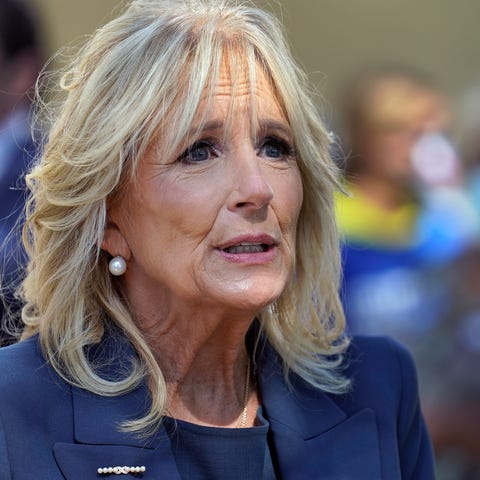 Jill Biden speaks to reporters while campaigning f