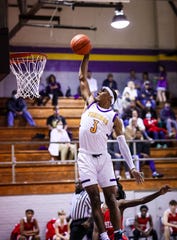 Opelousas Catholic's Keon Coleman goes up for a dunk