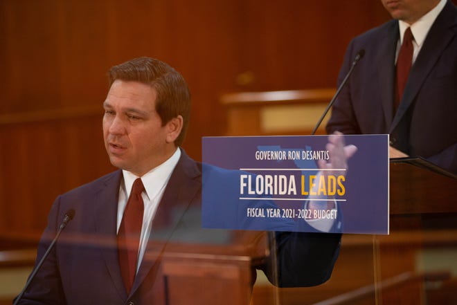 Gov. Ron DeSantis reveals his fiscal year 2021-2022 budget proposal in a press conference at the Capitol Thursday, Jan. 28, 2021.