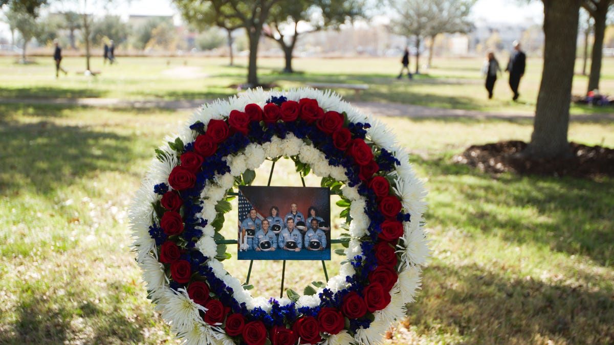A wreath commemorating the seven astronauts who perished in the space shuttle Challenger accident rests in the Astronaut Memorial Tree Grove during the annual National Day of Remembrance ceremony at the Johnson Space Center on Thursday, Jan. 27, 2011, in Houston.