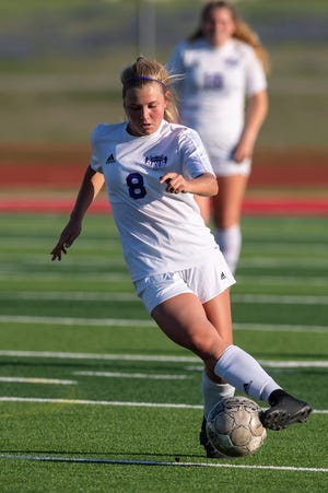 Emma Stephens, controlling the ball for Liberty Hill in a recent game against Belton, loves soccer and riding horses. She owned two horses before eventually selling them.