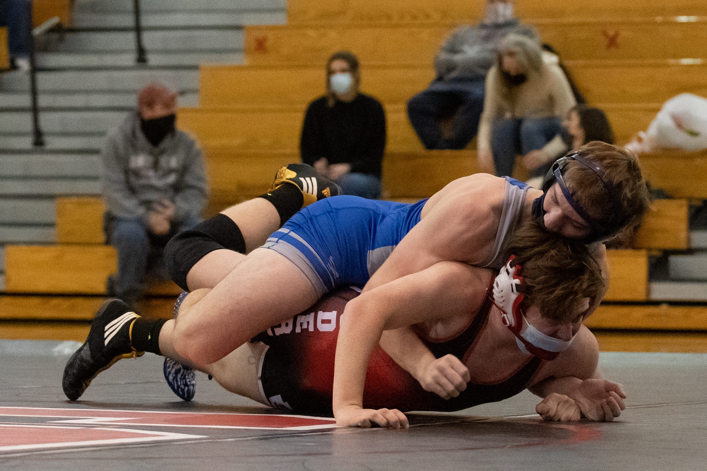 Area wrestling coaches and wrestlers continue to do what's needed to