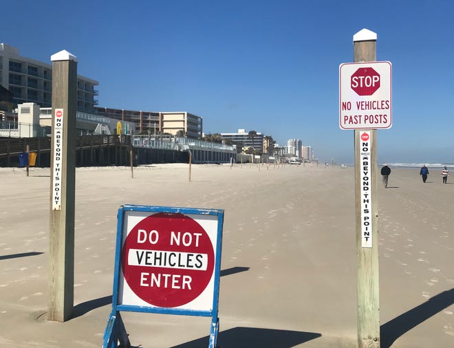 The stretch of beach behind Daytona's Hard Rock Hotel is a no-drive zone, blocked off by these poles.
