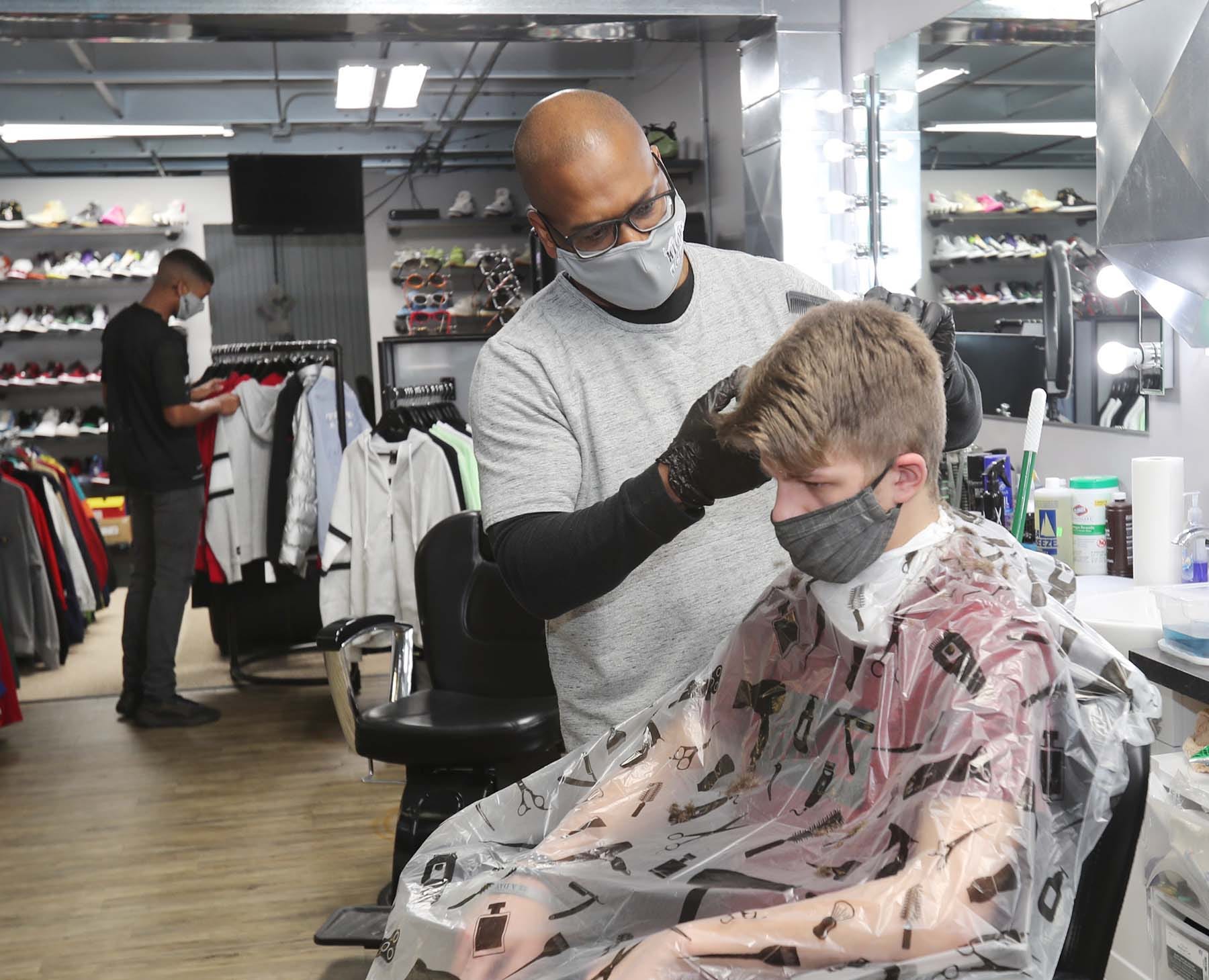 Black-owned barber shop, shoe store 