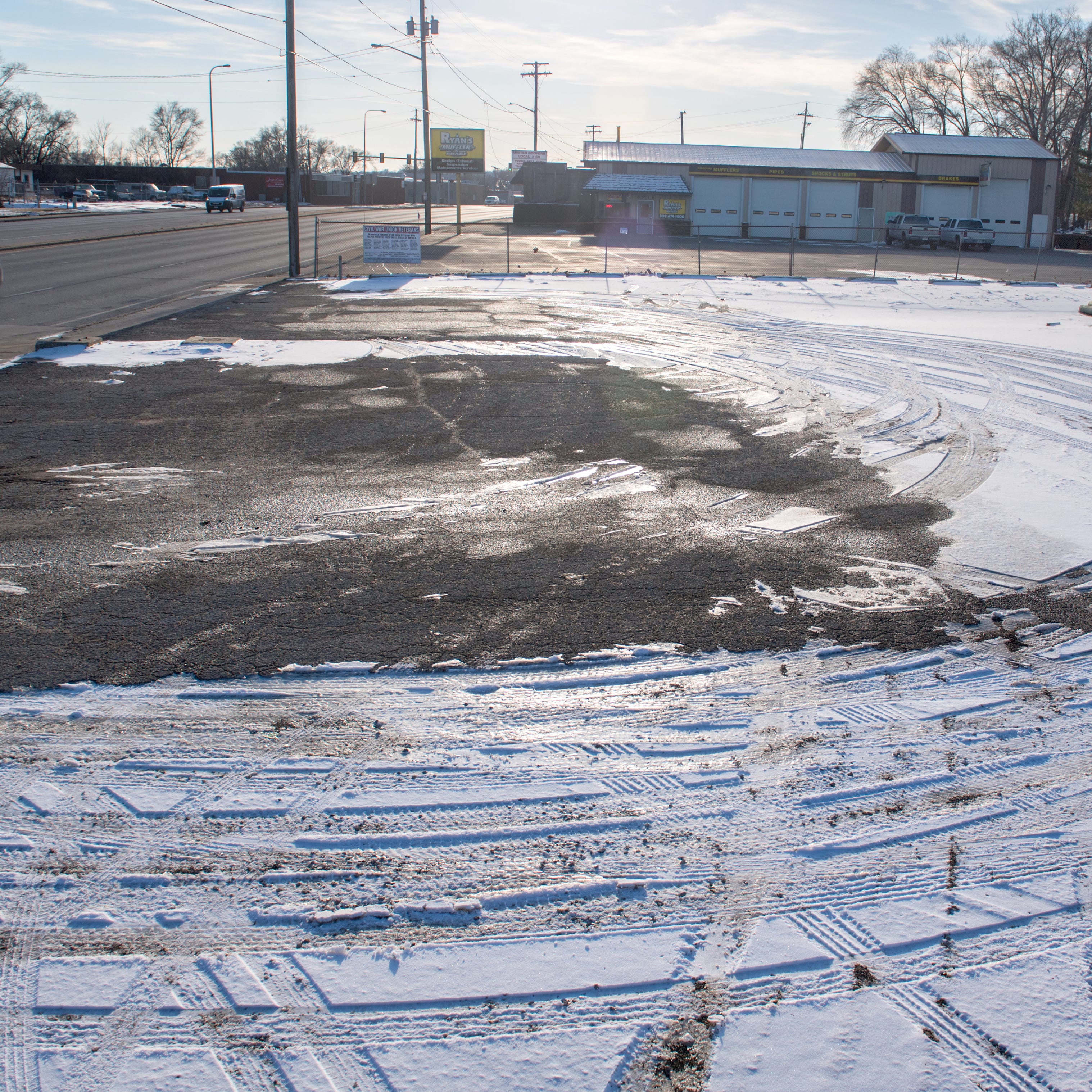 This paved area around 3915 SW Adams is believed to be the final resting place of Nance Legins-Costley of Pekin, the first slave legally freed by Abraham Lincoln. The area was once known as Moffatt Cemetery before the city paved over it.
