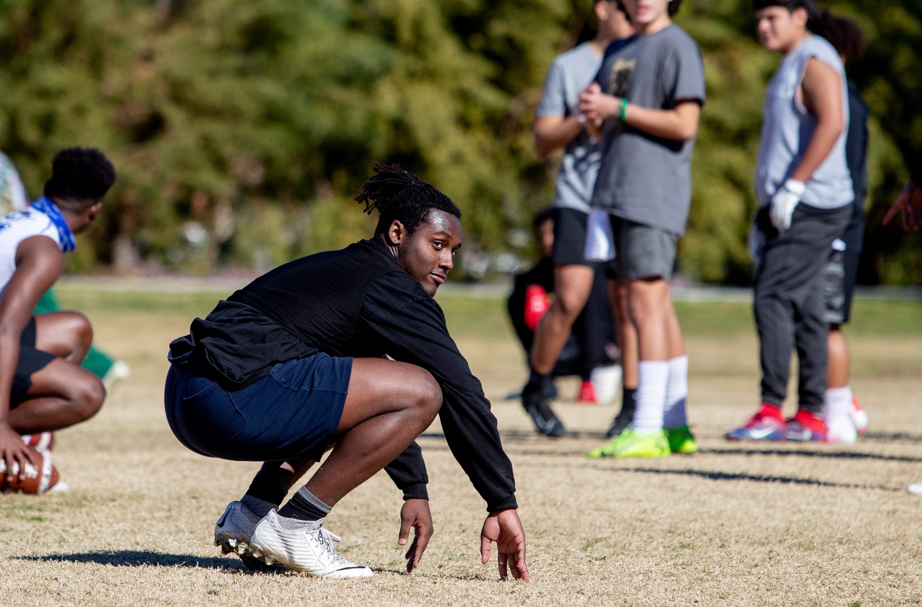 Arieon Capler readies himself for the next play during tryouts for the Desert Diablos club football team at La Quinta Park in La Quinta, Calif., on January 30, 2021. 