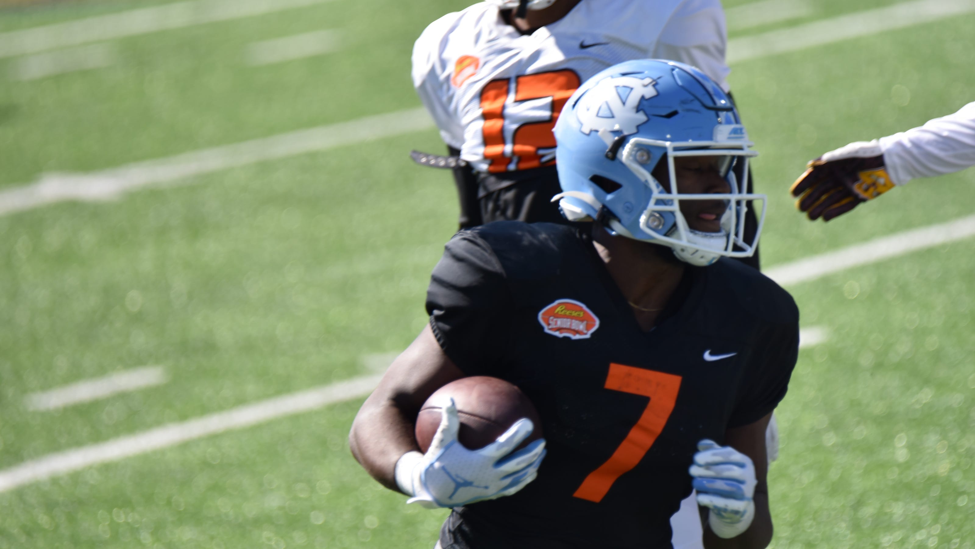 Mack Brown compares Michael Carter, Javonte Williams to college football legends Mack Brown compares Michael Carter, Javonte Williams to college football legends