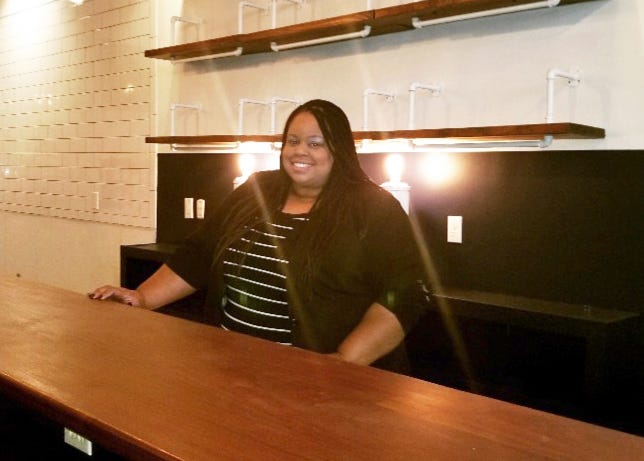 Julia Broome opened her soul food restaurant Kin Southern Table + Bar in Providence on Washington St.