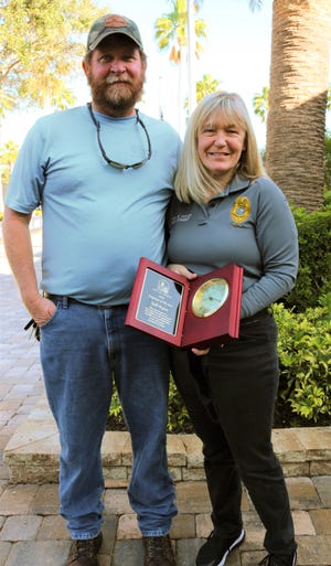 Ron and Kelli Peyton pose outside of Venice City Hall on Jan. 26, shortly after receiving Kelli’s Employee of the Year Award at the Venice City Council meeting.