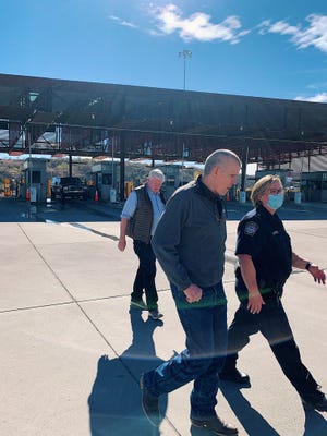 Montana Representative Matt Rosendale walks with a U.S. Border Patrol agent at a port of entry on the Arizona/Mexico border