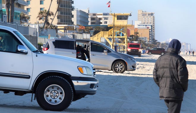 A few parked cars on the beach north of Andy Romano Park,  Wednesday February 3, 2021,