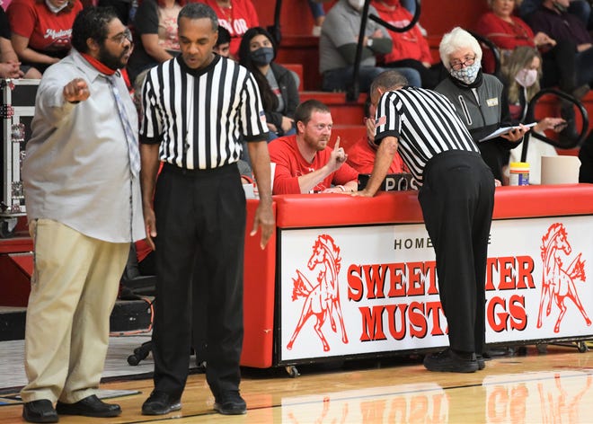 Basketball officials have enough to do at a game without dealing with unruly fans.