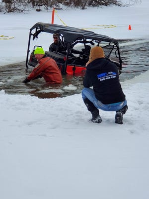 A UTV was removed from Okauchee Lake after it broke through the ice on Jan. 30.